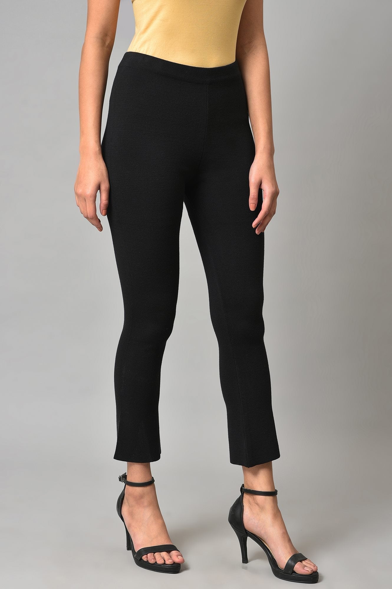 W for Woman Black Solid Knitted Flared Pants