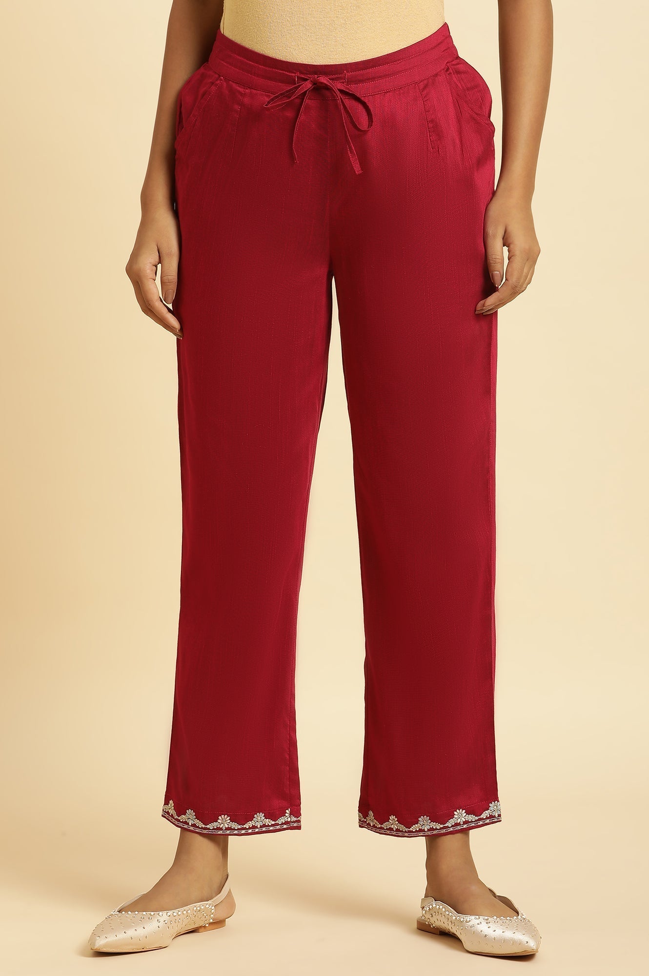 W for Woman Magenta Solid Pants With Embroidery On Hem