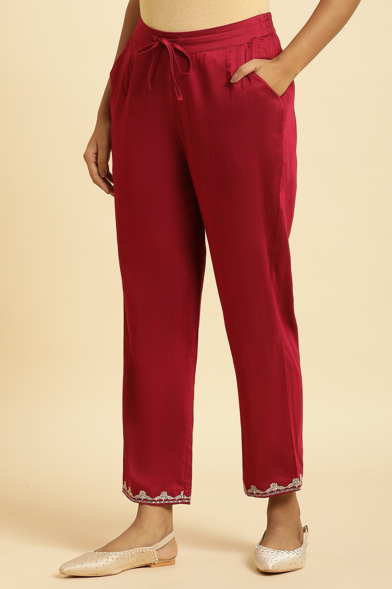 W for Woman Magenta Solid Pants With Embroidery On Hem