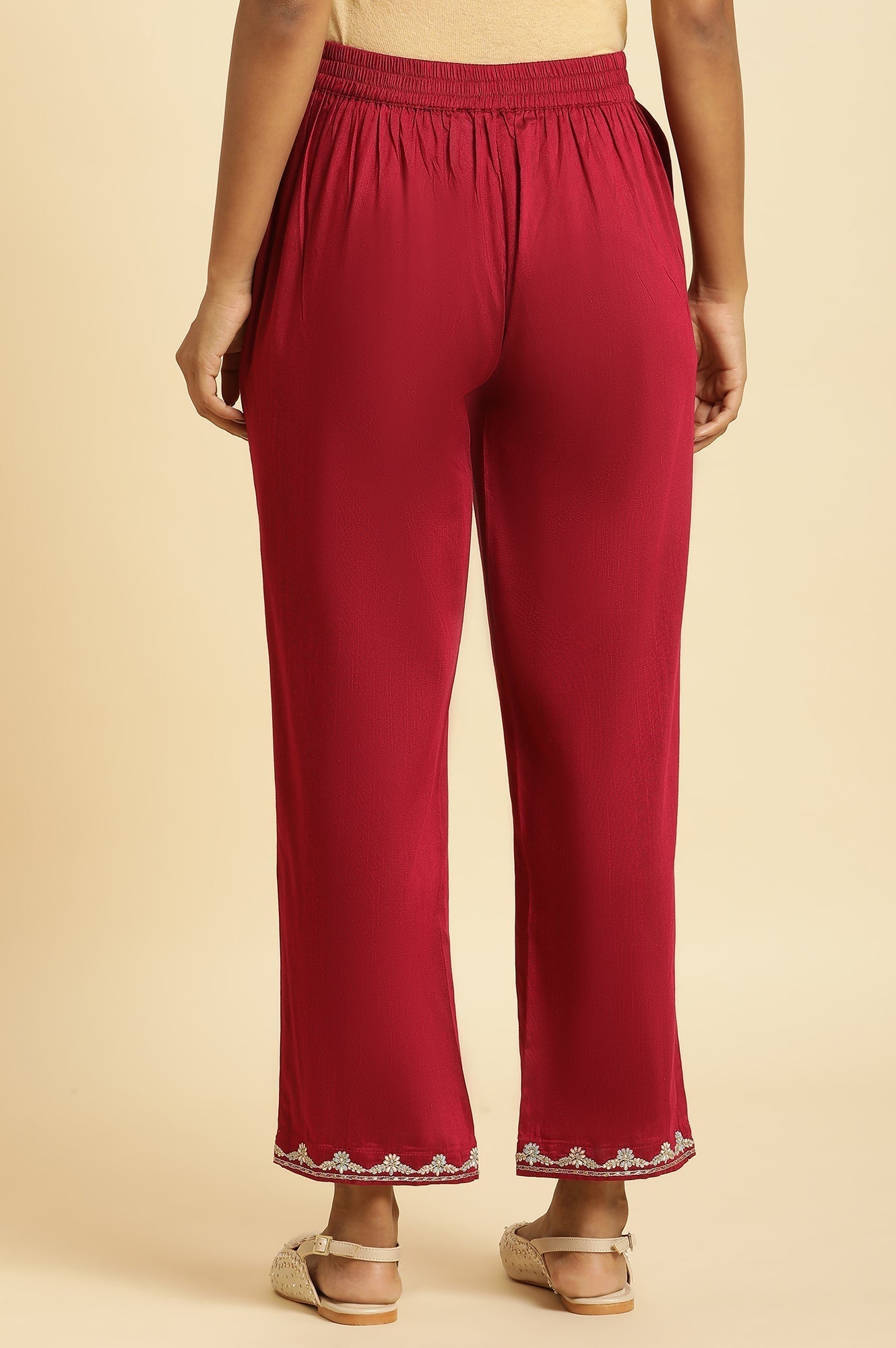 W for Woman Magenta Solid Pants With Embroidery On Hem