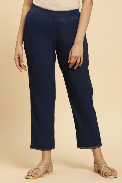 W for Woman Blue Solid Pants With Metallic Sequin Hemline