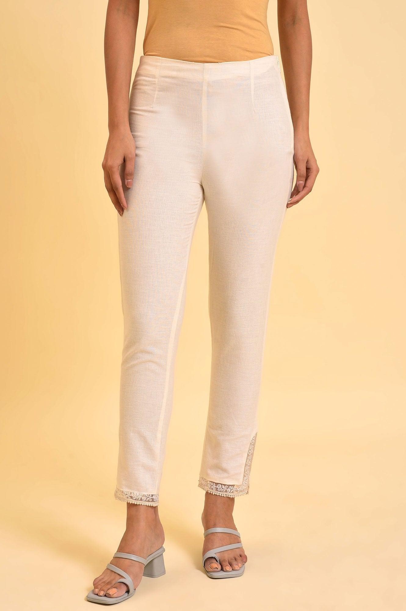 W for Woman Ecru Solid Slim Pants With Lace On Hem