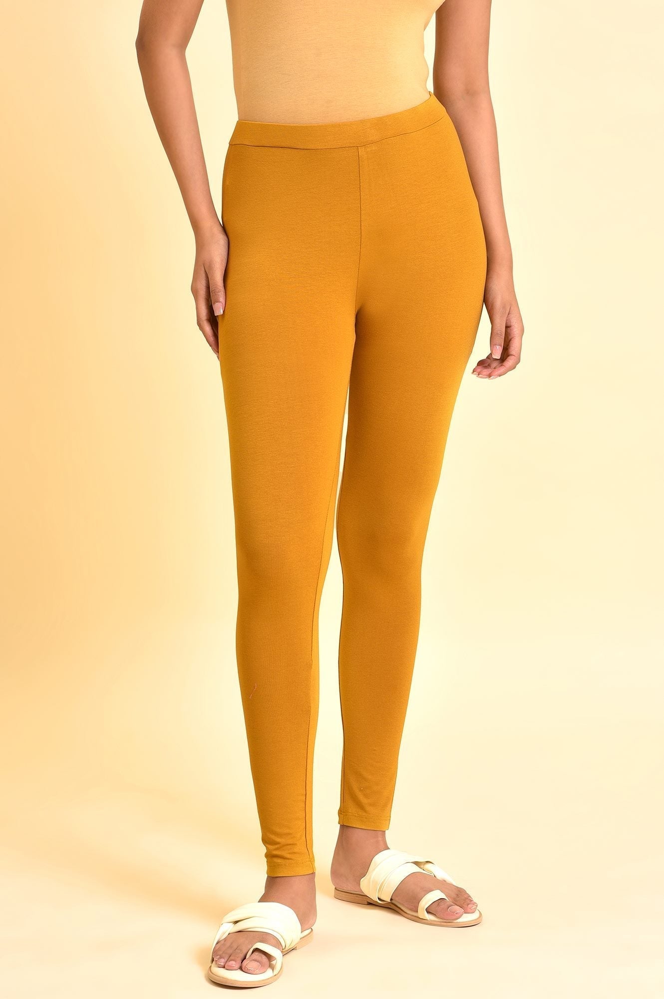 W for Woman Mustard Yellow Solid Viscose Lycra Tights