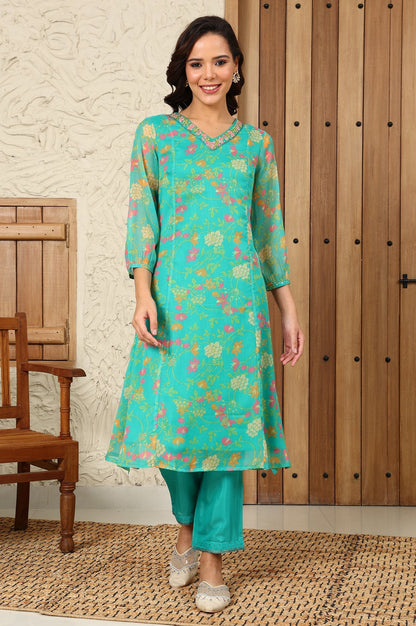 W for Woman Teal Blue Floral Printed Embroidered Neckline Chiffon A-Line Kurta