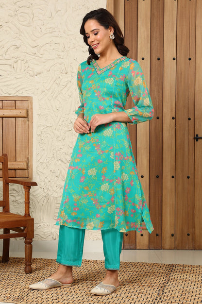W for Woman Teal Blue Floral Printed Embroidered Neckline Chiffon A-Line Kurta