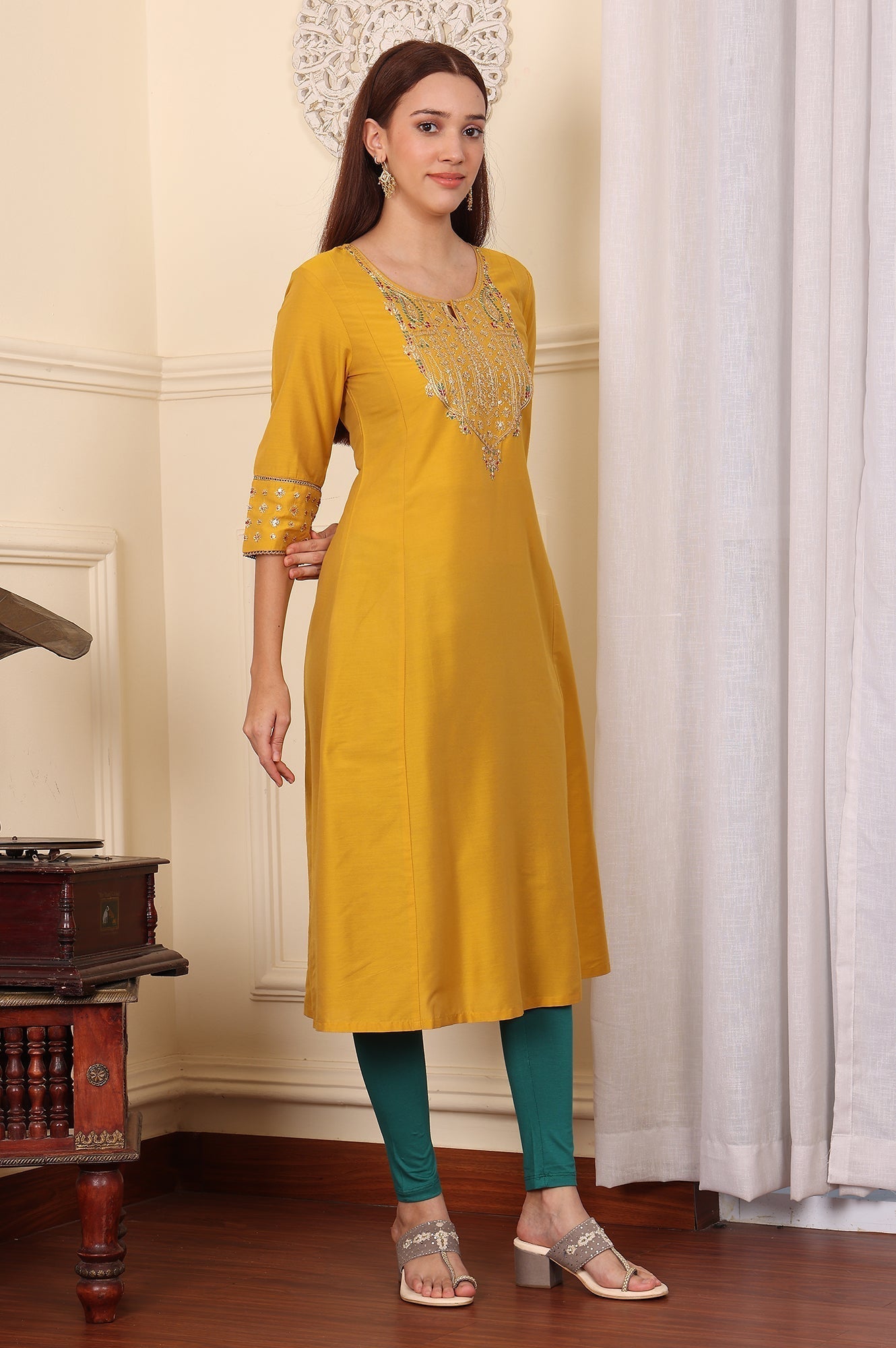 W for Woman Mustard Yellow Solid Flared Kurta With Embroidered Yoke