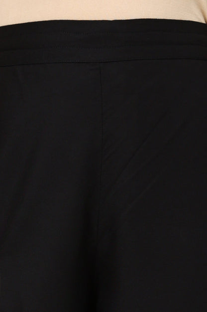 W for Woman Black Solid Rayon Parallel Pants With Embellished Organza Hemline