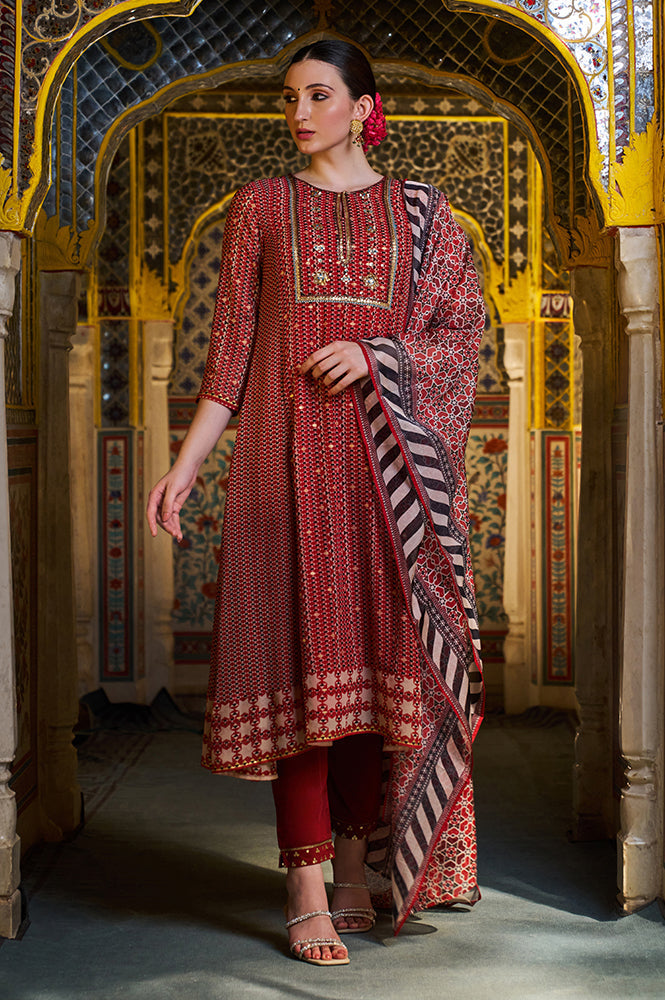 W for Woman Rust Red Geometric Printed Embroidered Flared Kurta, Pants And Dupatta Set
