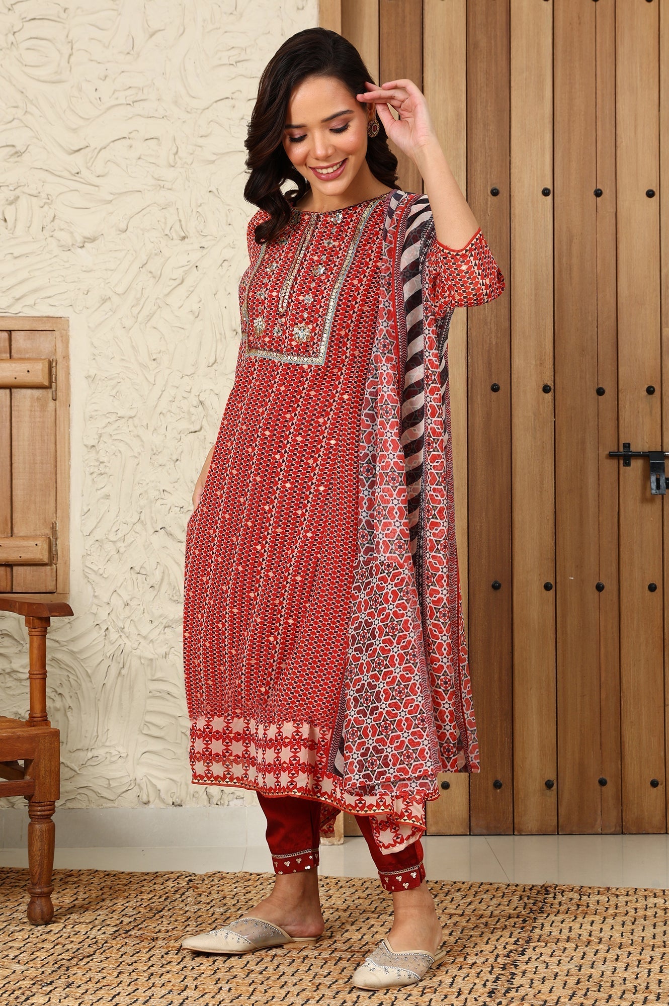 W for Woman Rust Red Geometric Printed Embroidered Flared Kurta, Pants And Dupatta Set