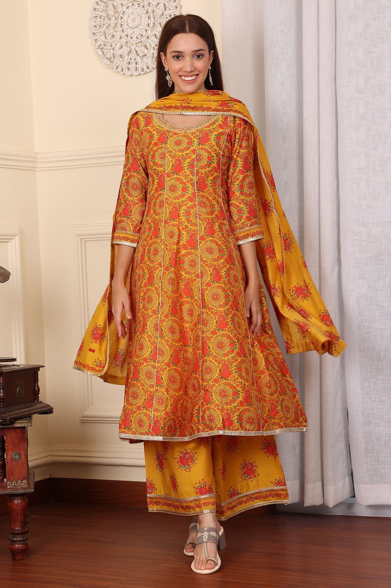 W for Woman Mustard Yellow Floral Printed Chanderi Anarkali Kurta With Embroidery, Flared Pants And Dupatta Set