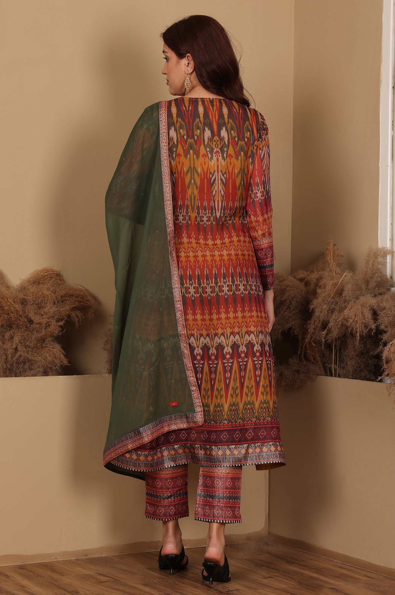 W for Woman Mustard Yellow Ikkat Printed Embellished Organza Anarkali Kurta, Pants And Dupatta Set