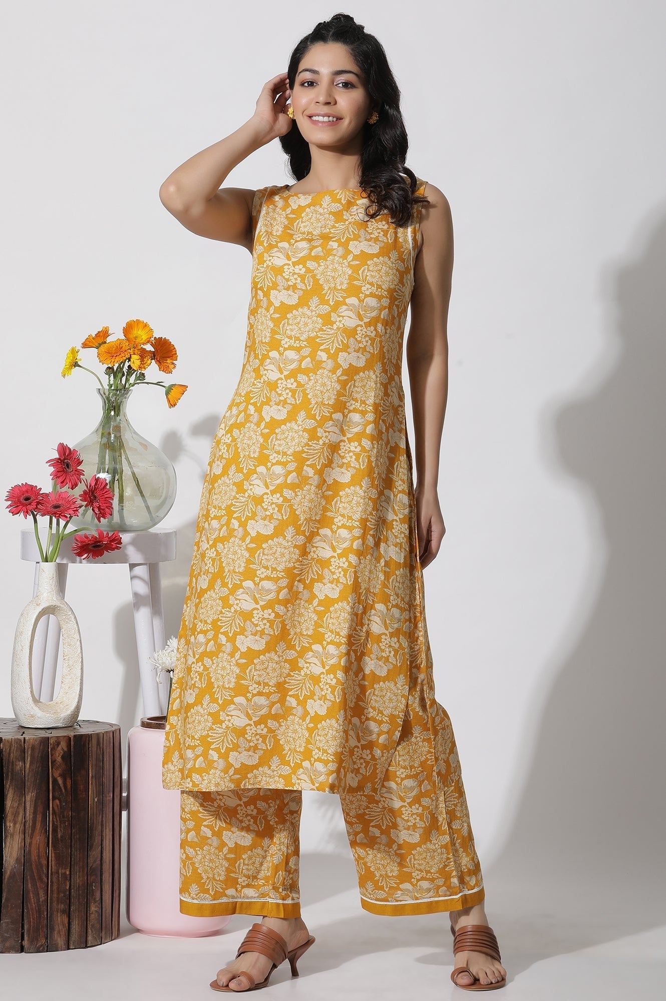 W for Woman Mustard Floral Printed A-Line Kurta And Flared Pants Set