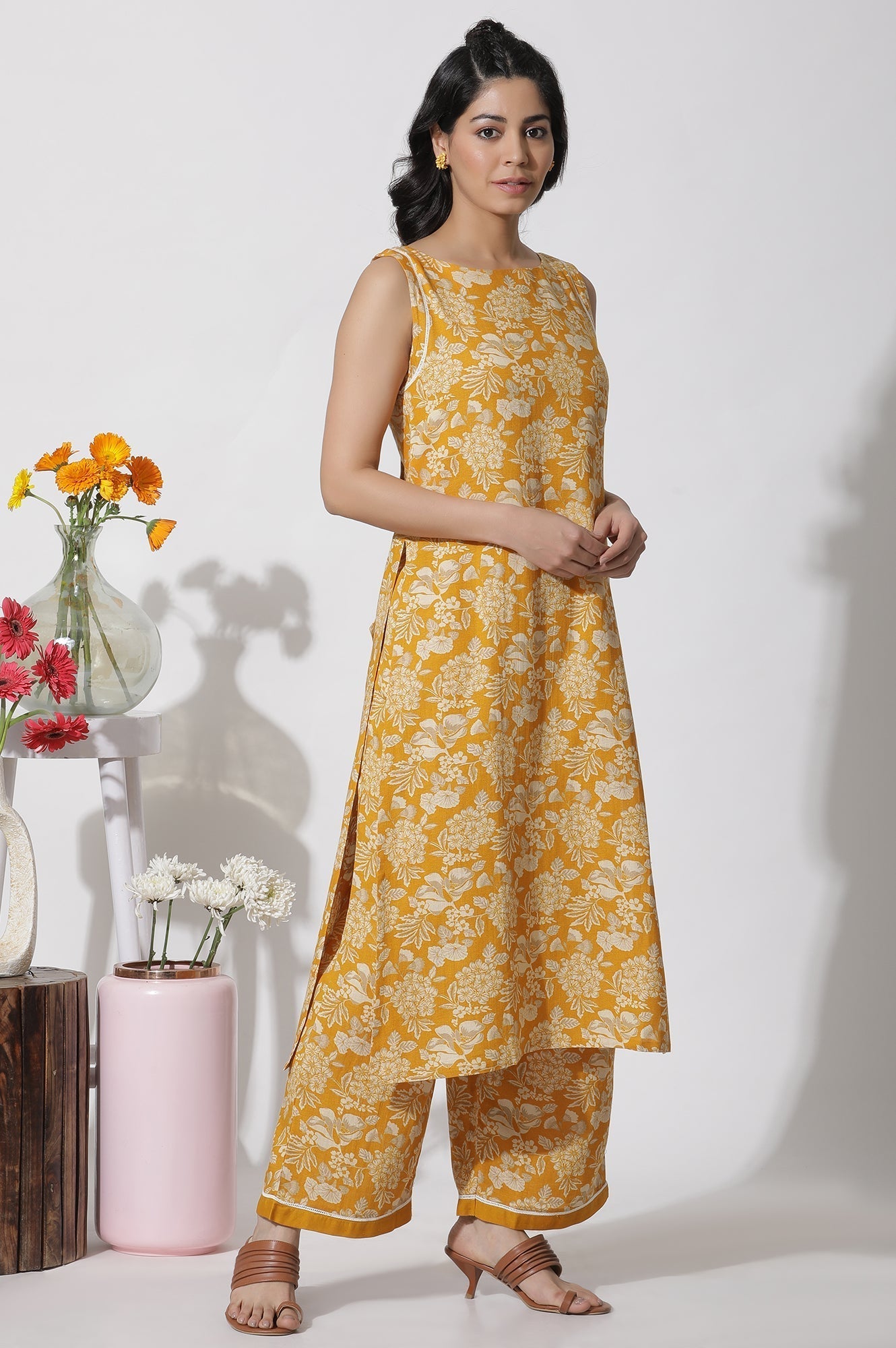 W for Woman Mustard Floral Printed A-Line Kurta And Flared Pants Set