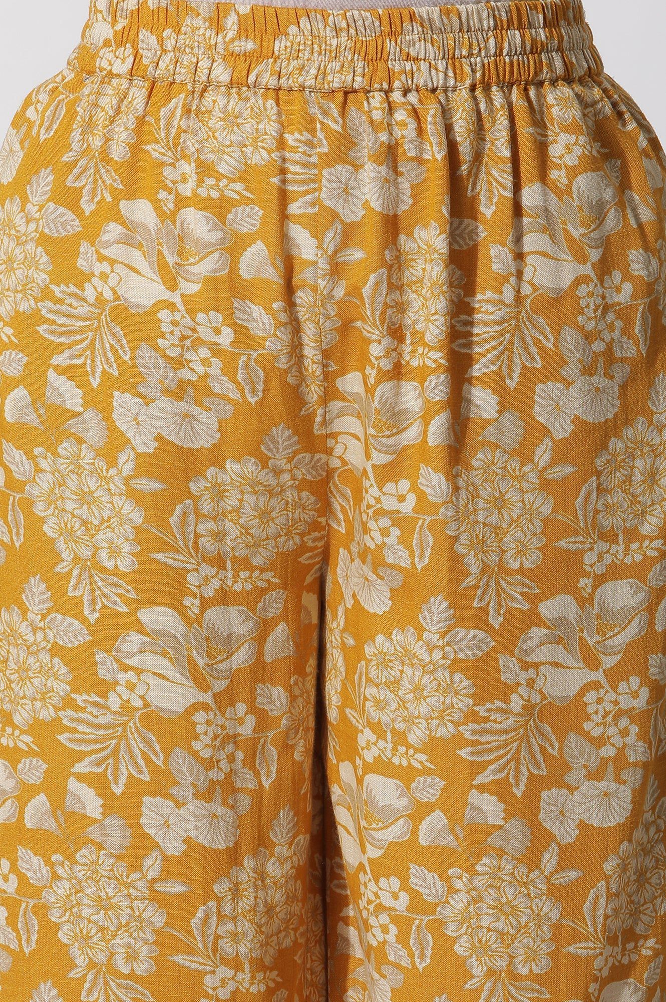 W for Woman Mustard Floral Printed A-Line Kurta And Flared Pants Set