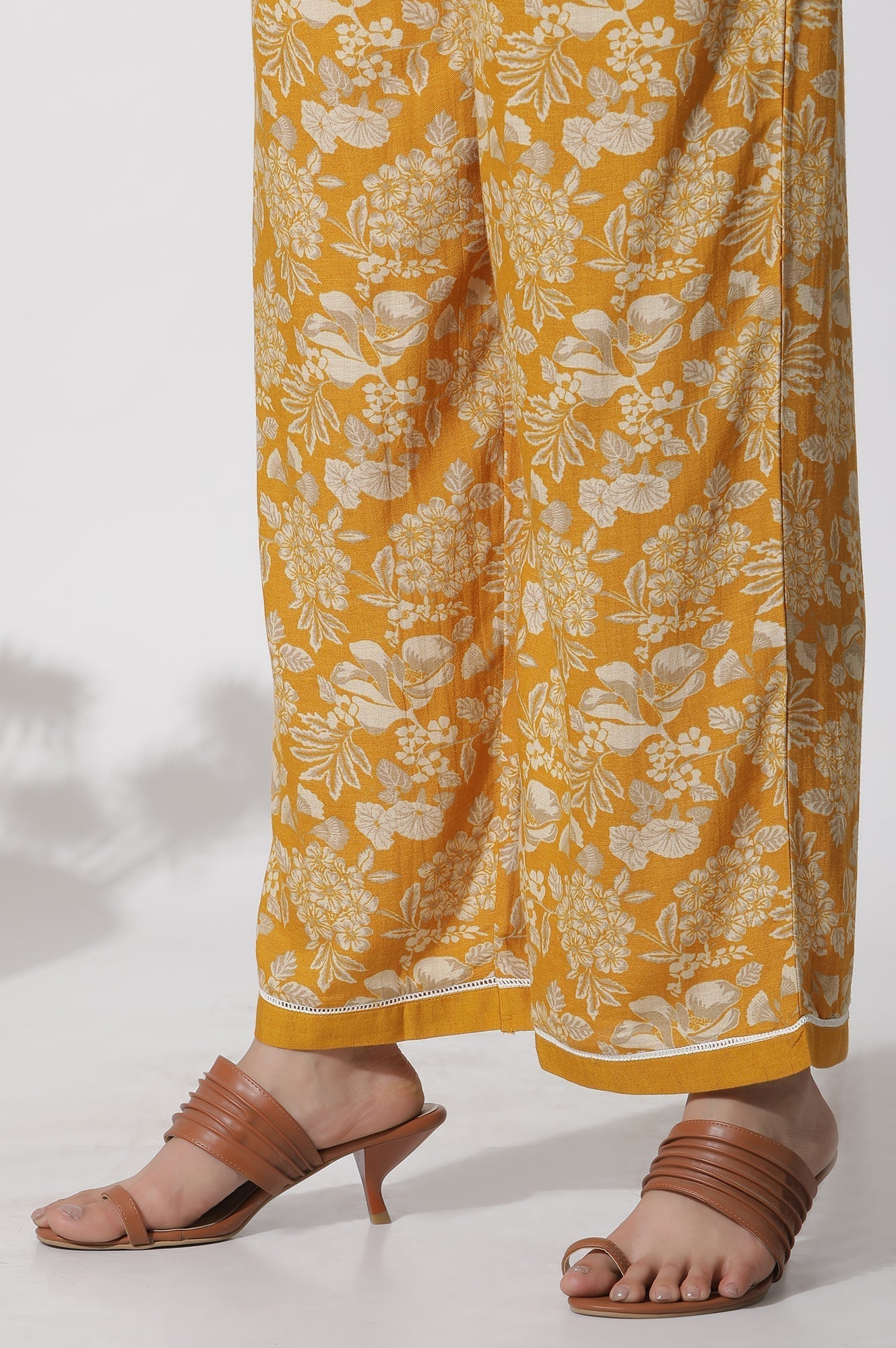 W for Woman Mustard Floral Printed A-Line Kurta And Flared Pants Set