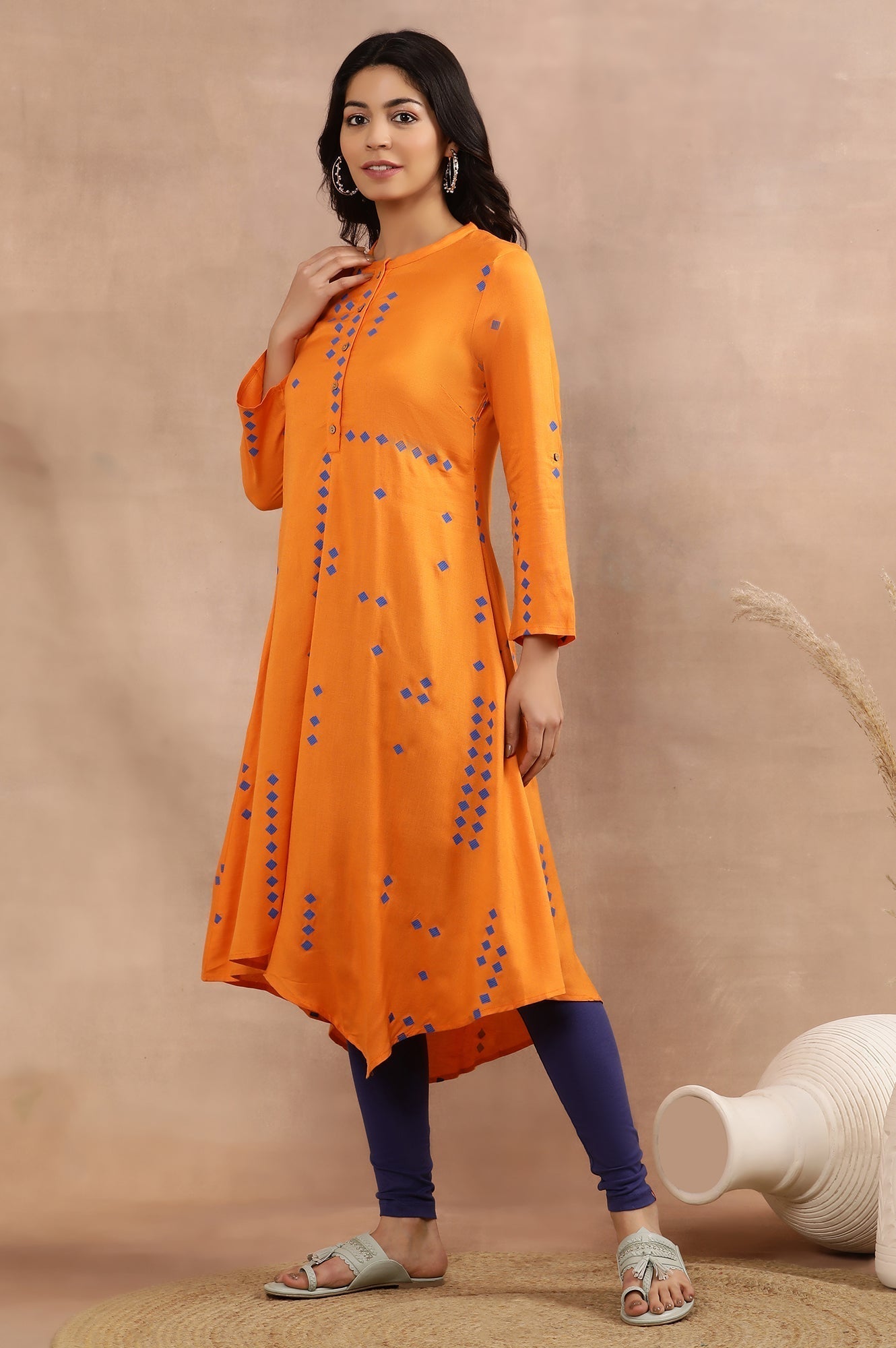 W for Woman Orange Printed Asymmetrical Kurta And Tights Set