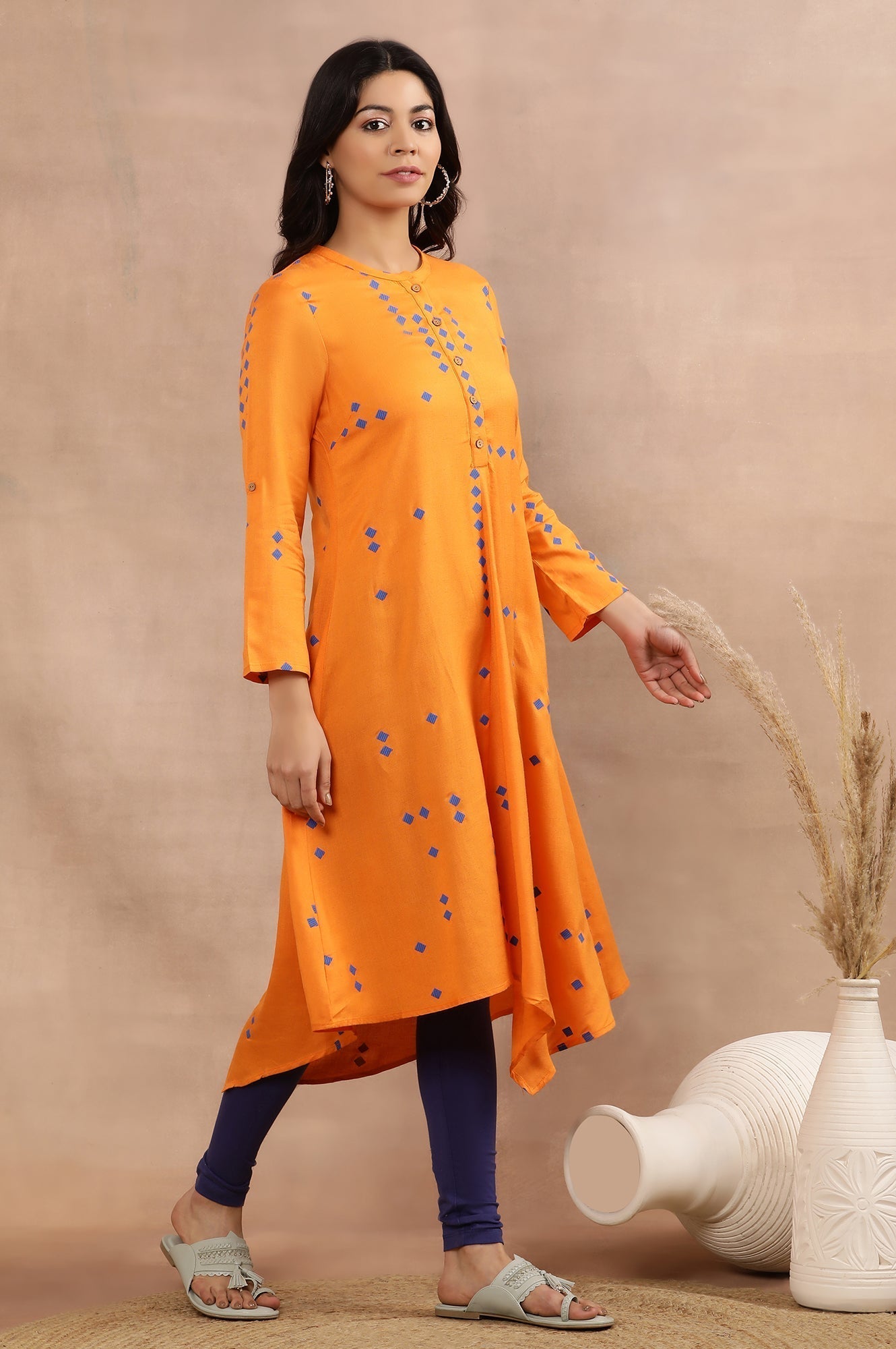 W for Woman Orange Printed Asymmetrical Kurta And Tights Set
