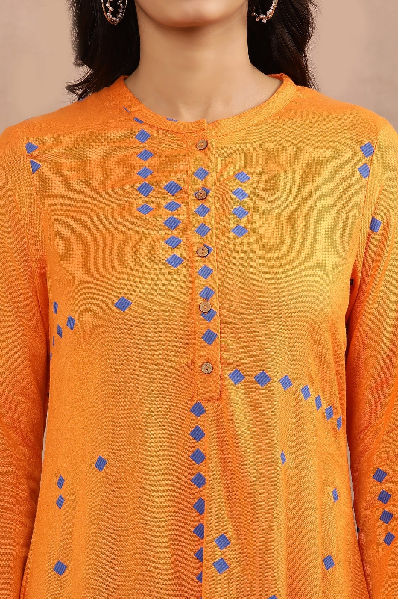 W for Woman Orange Printed Asymmetrical Kurta And Tights Set