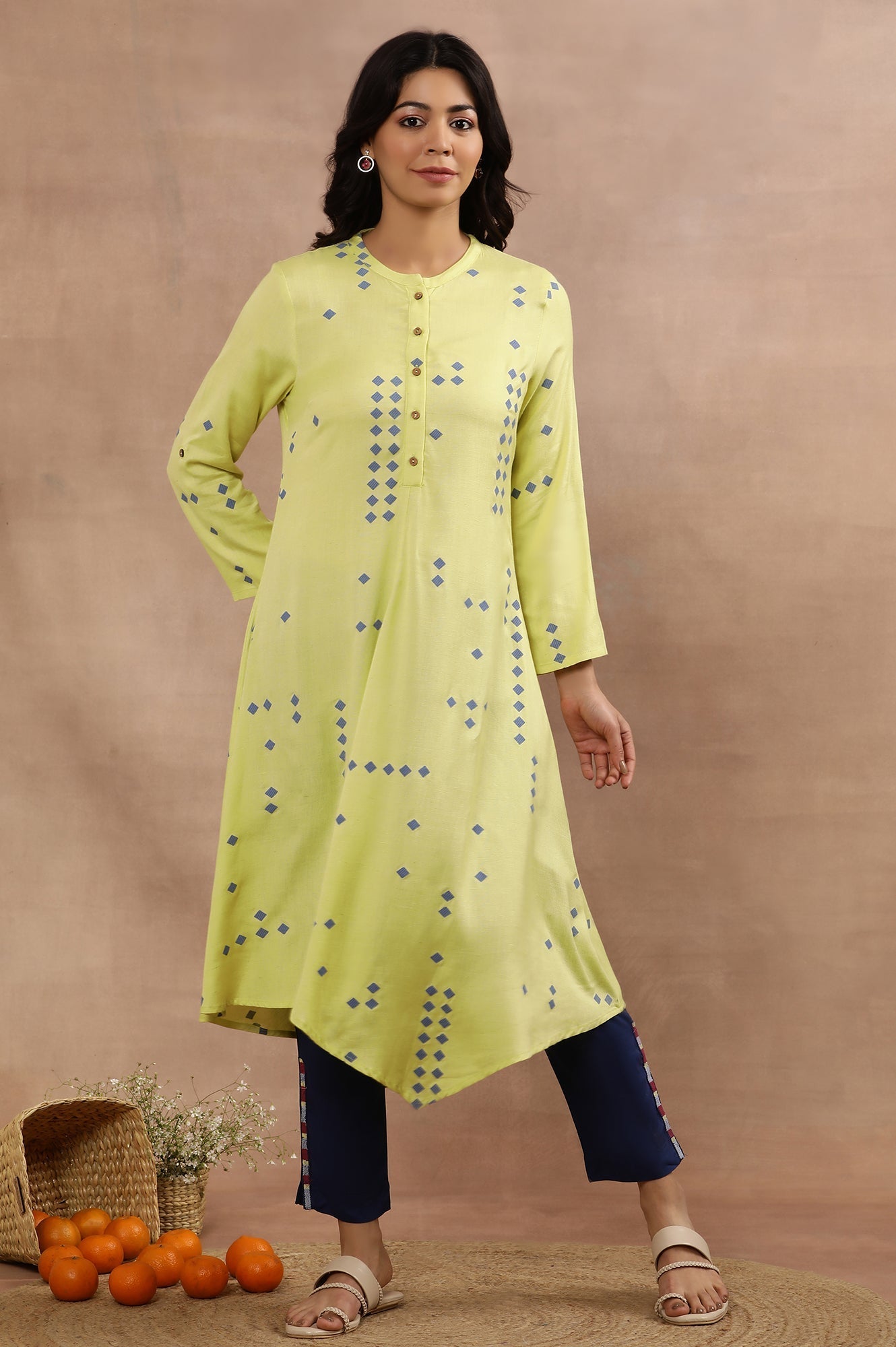 W for Woman Green Printed Asymmetrical Kurta And Blue Slim Pants Set