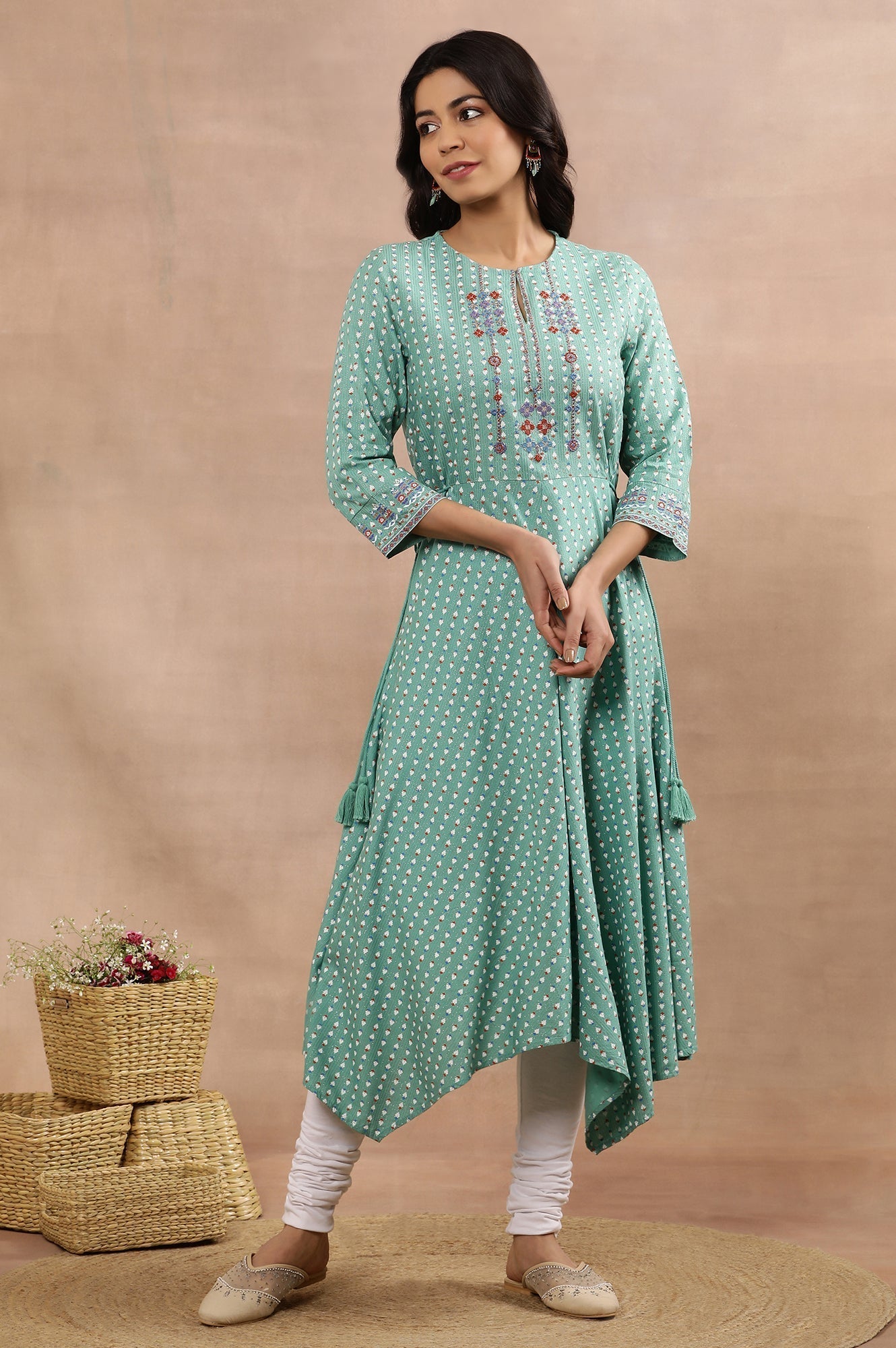 W for Woman Green Asymmetrical Printed Kurta And Churidar Set