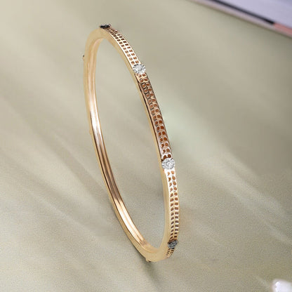 Modern Gleam Diamond Bangle in 14K Yellow and White, 0.18 ct
