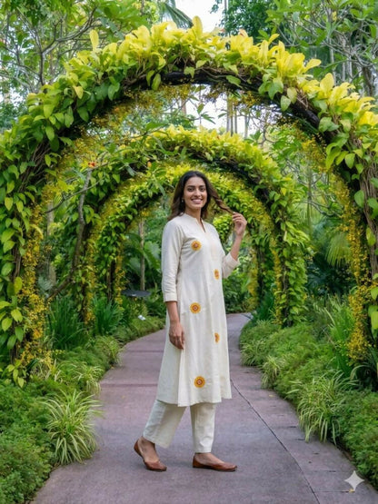 Teeya Creation New Latest Women Off-White & Yellow Embroidered Cotton A-Line Kurta with Trousers