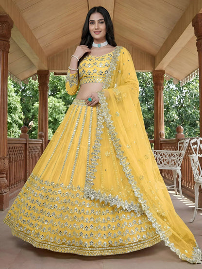 Tulsi Art Captivating Yellow Foil Work Net Sangeet Wear Lehenga Choli