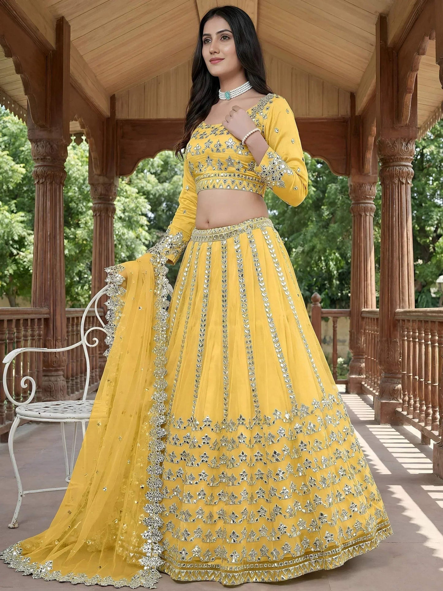 Tulsi Art Captivating Yellow Foil Work Net Sangeet Wear Lehenga Choli