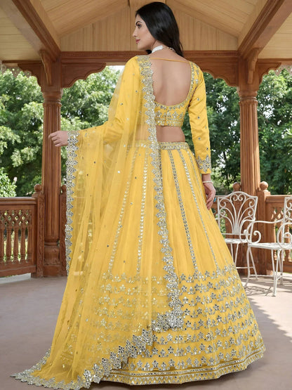 Tulsi Art Captivating Yellow Foil Work Net Sangeet Wear Lehenga Choli