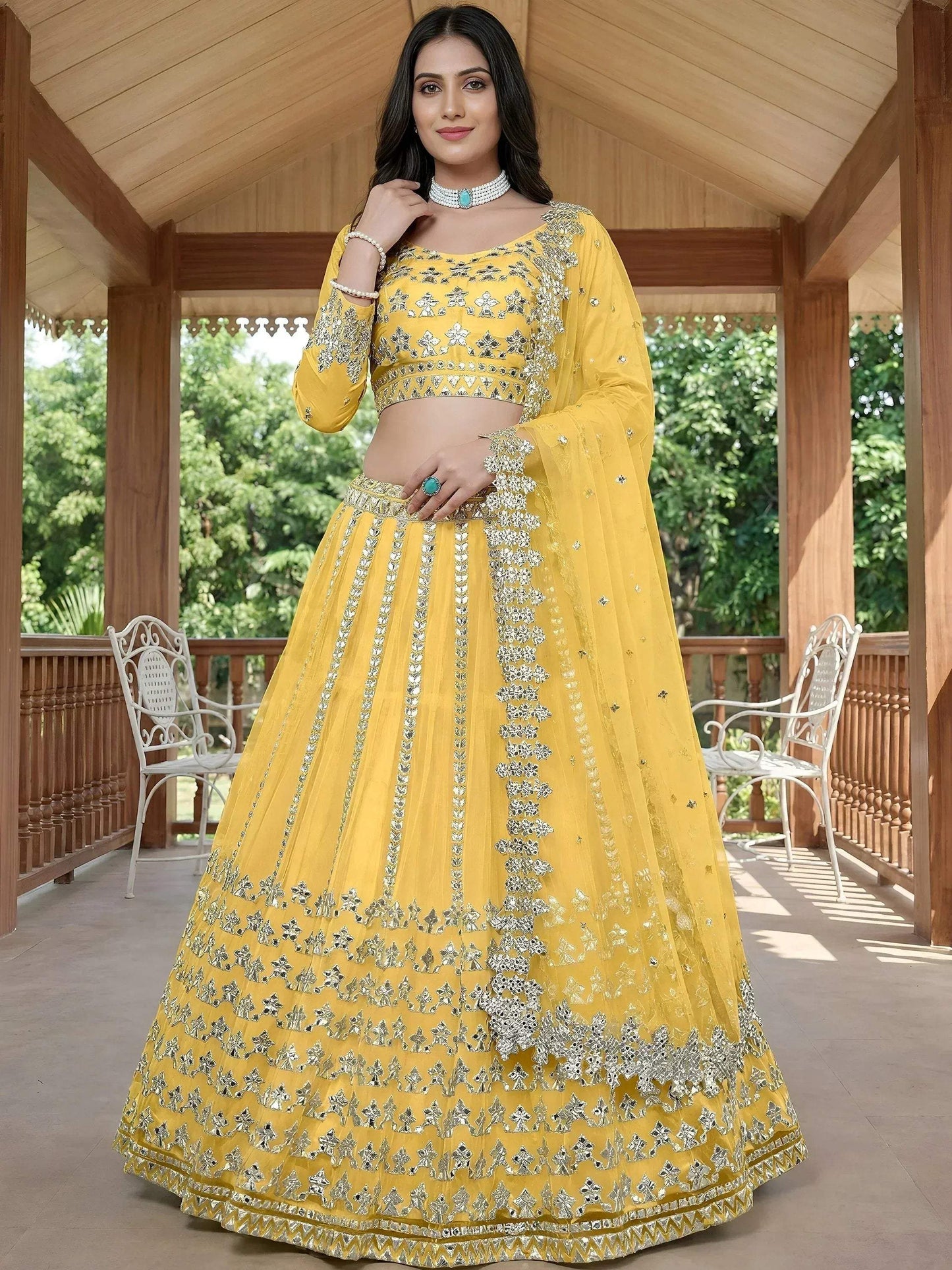 Tulsi Art Captivating Yellow Foil Work Net Sangeet Wear Lehenga Choli