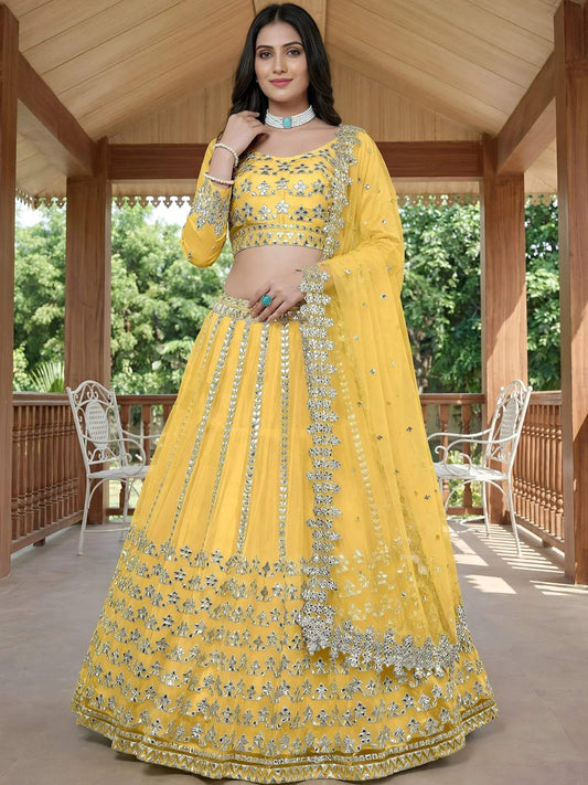 Tulsi Art Captivating Yellow Foil Work Net Sangeet Wear Lehenga Choli