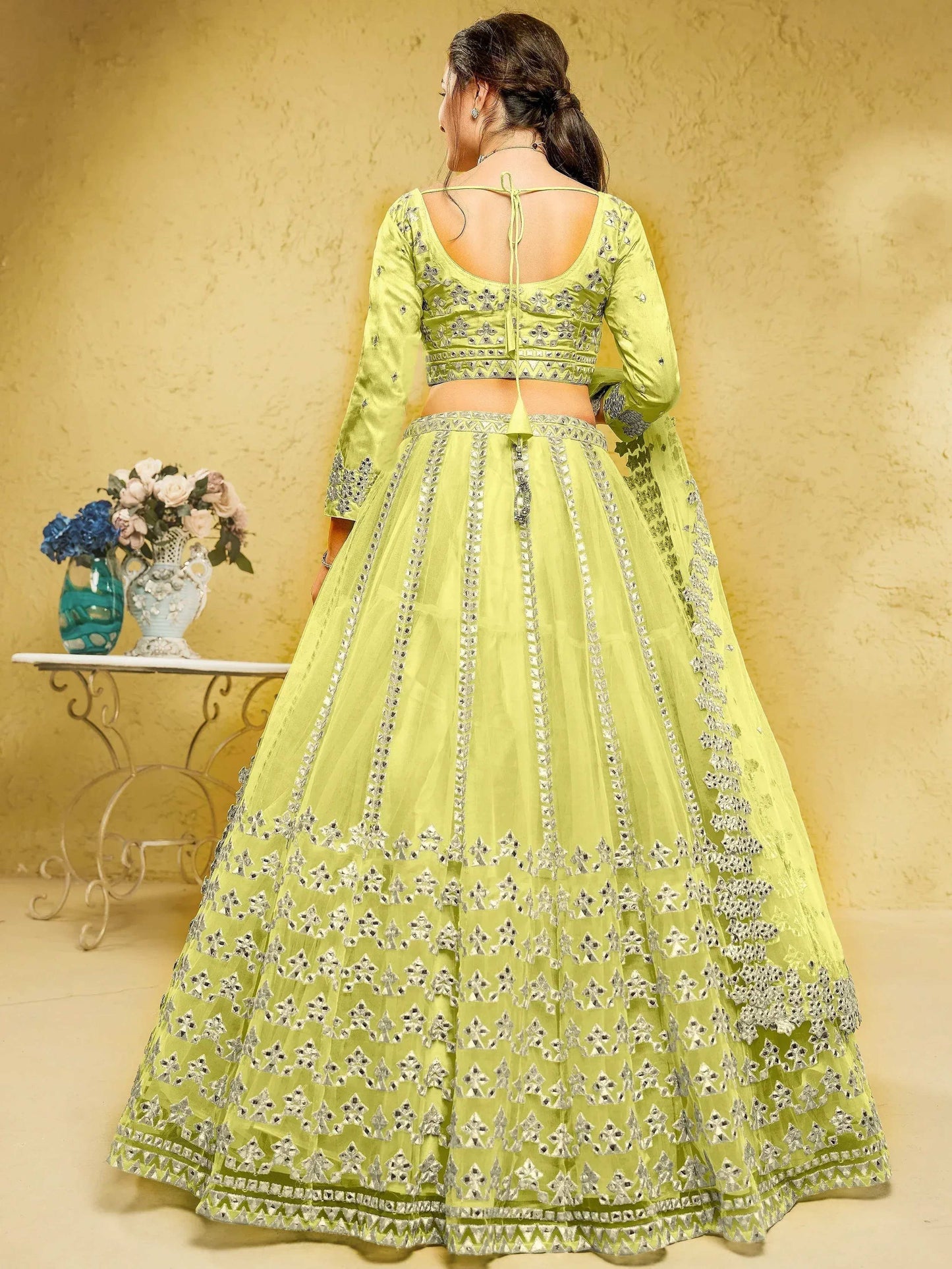 Tulsi Art Captivating Lime Yellow Foil Work Net Engagement Wear Lehenga Choli