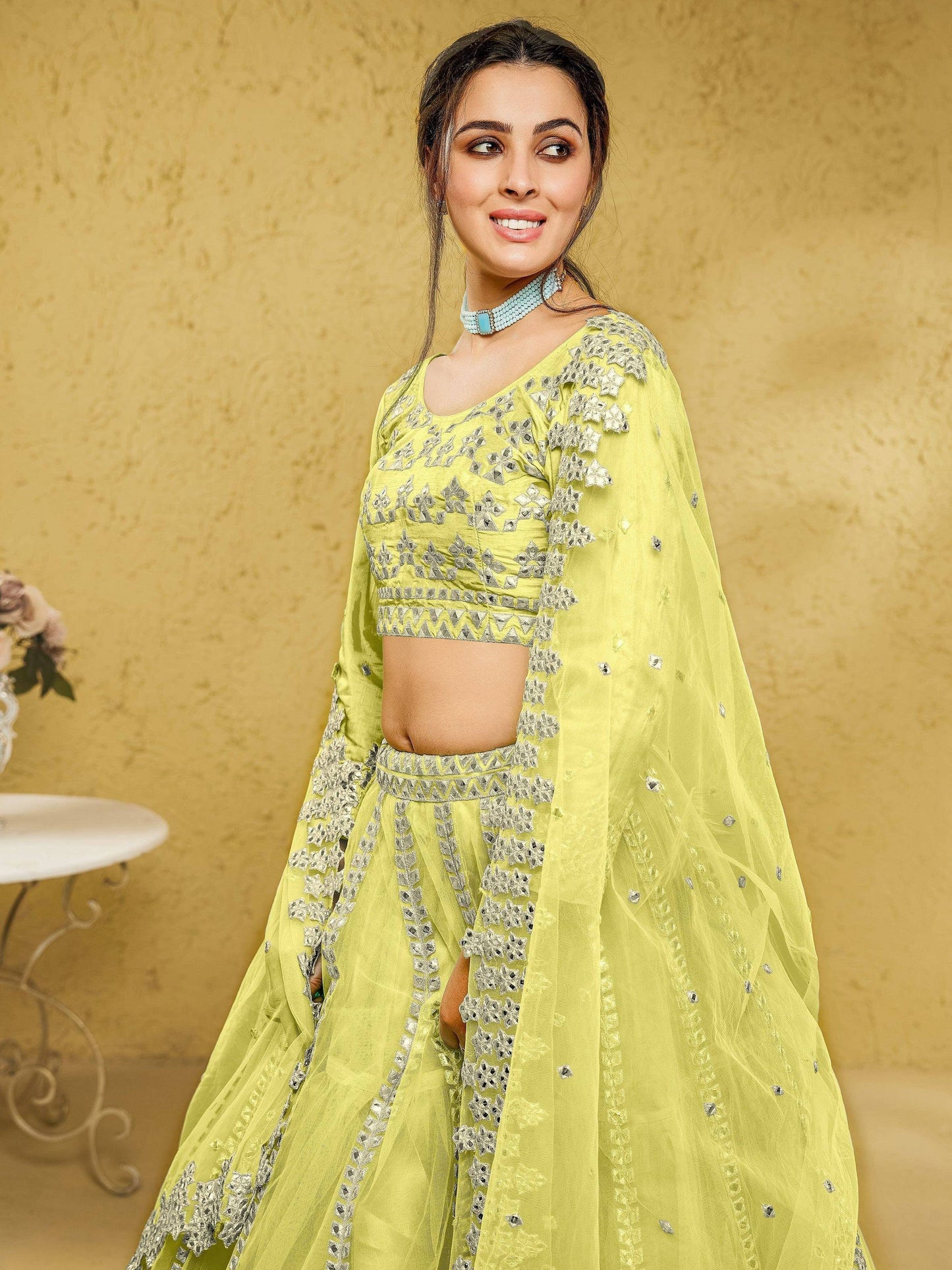 Tulsi Art Captivating Lime Yellow Foil Work Net Engagement Wear Lehenga Choli