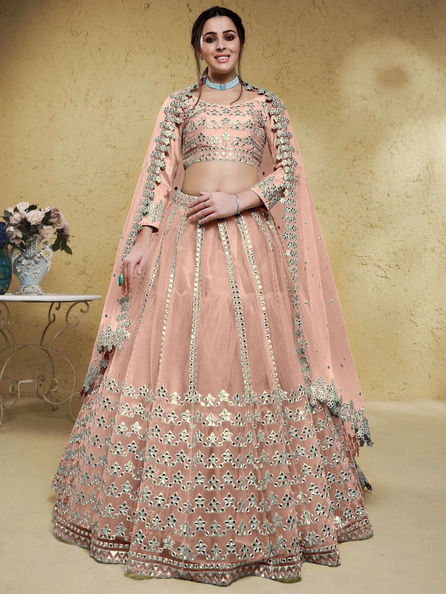 Tulsi Art Fascinating Dusty Pink Foil Work Net Bridesmaid Lehenga Choli