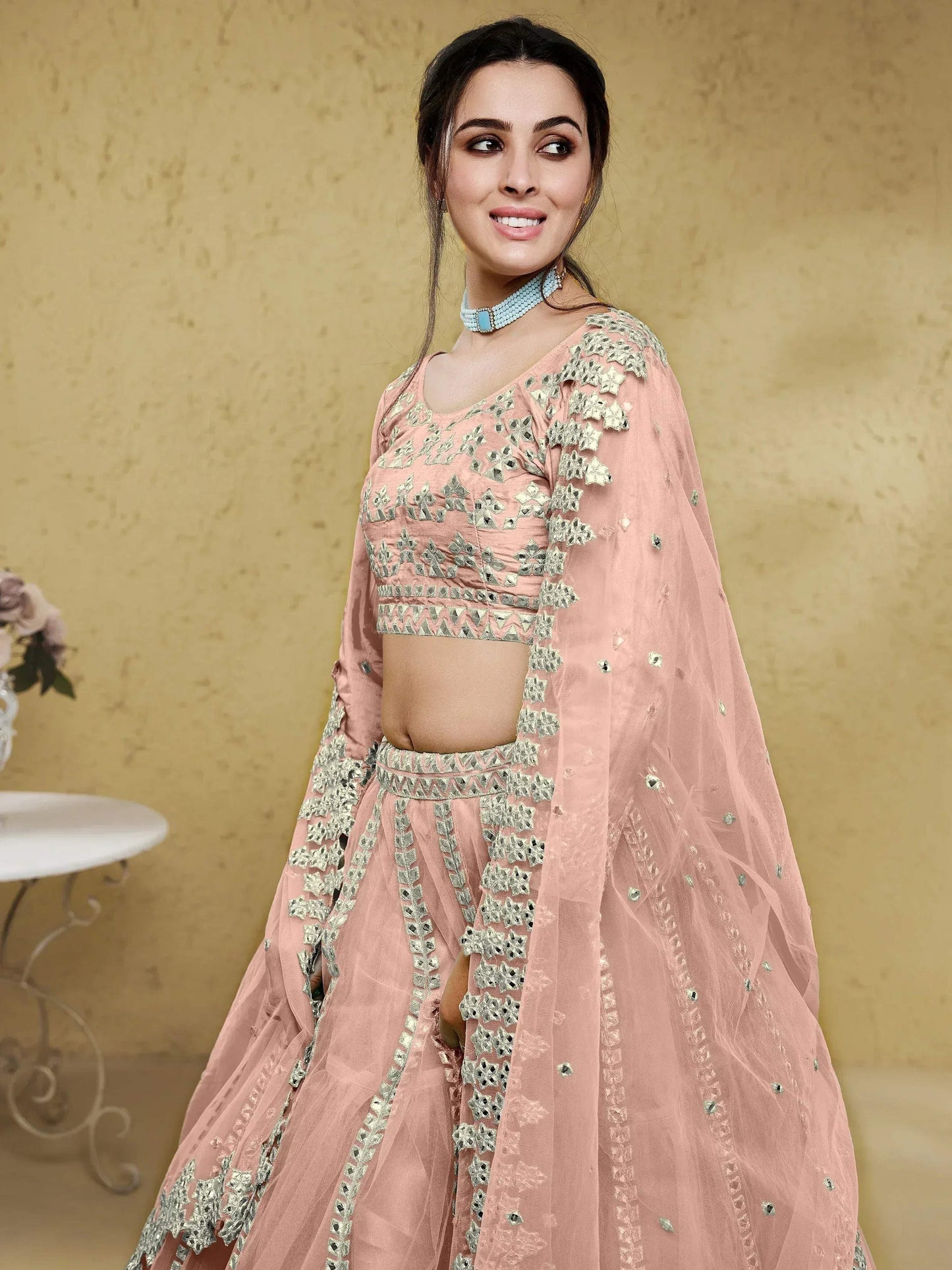 Tulsi Art Fascinating Dusty Pink Foil Work Net Bridesmaid Lehenga Choli
