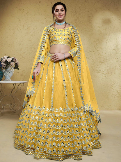 Tulsi Art Magnetic Yellow Foil Work Net Haldi Wear Lehenga Choli With Dupatta