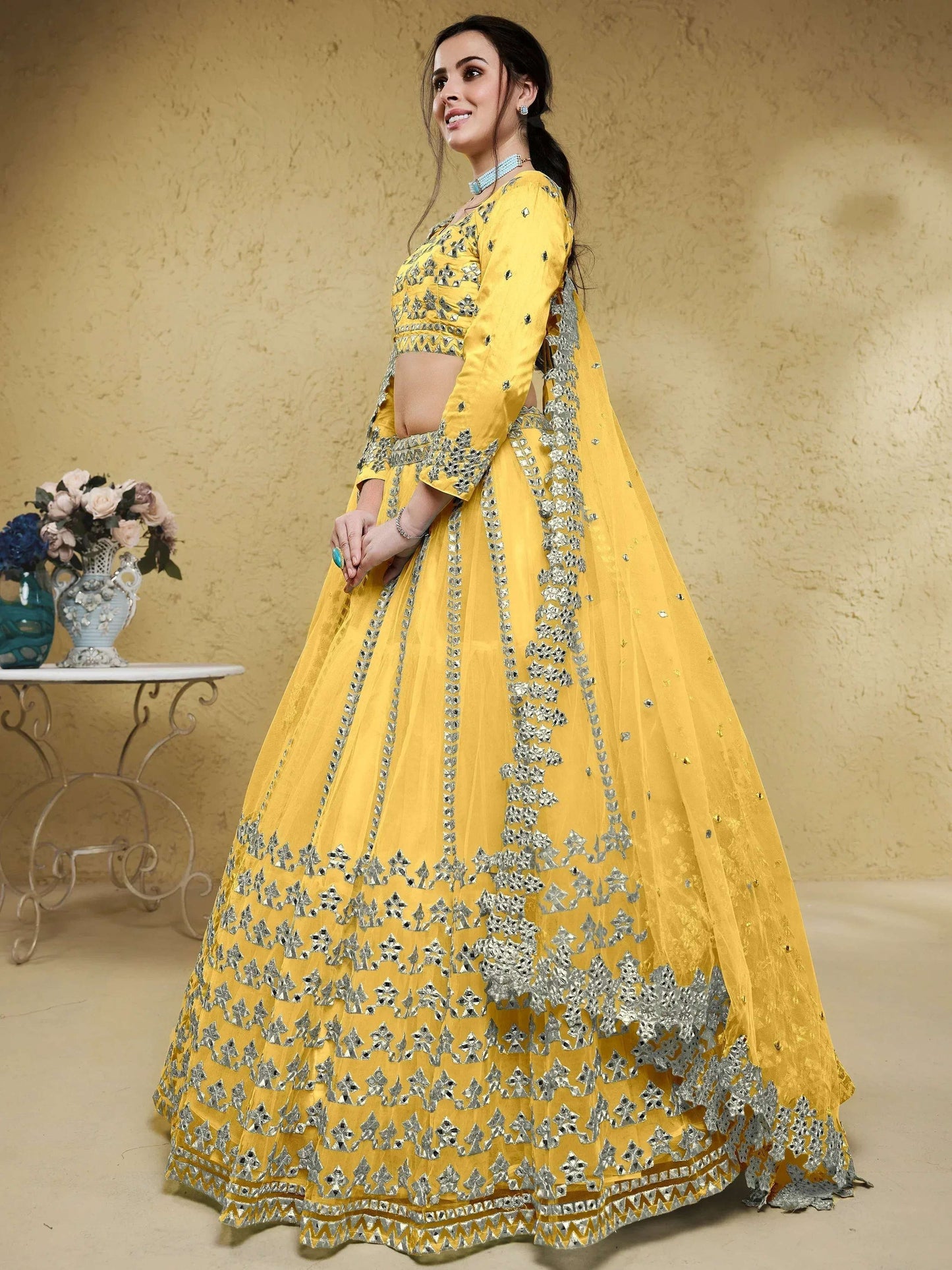 Tulsi Art Magnetic Yellow Foil Work Net Haldi Wear Lehenga Choli With Dupatta