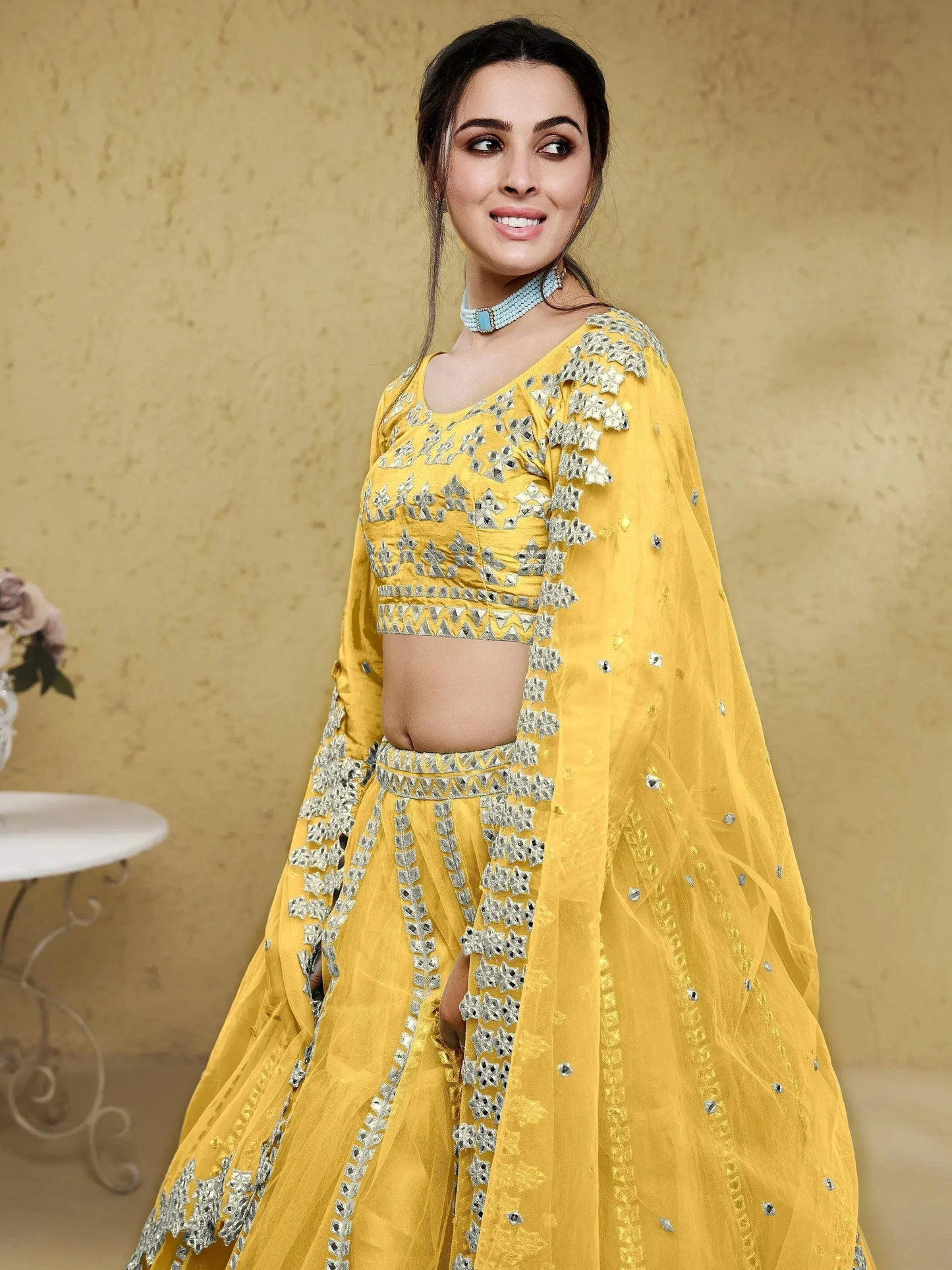 Tulsi Art Magnetic Yellow Foil Work Net Haldi Wear Lehenga Choli With Dupatta