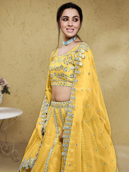 Tulsi Art Magnetic Yellow Foil Work Net Haldi Wear Lehenga Choli With Dupatta