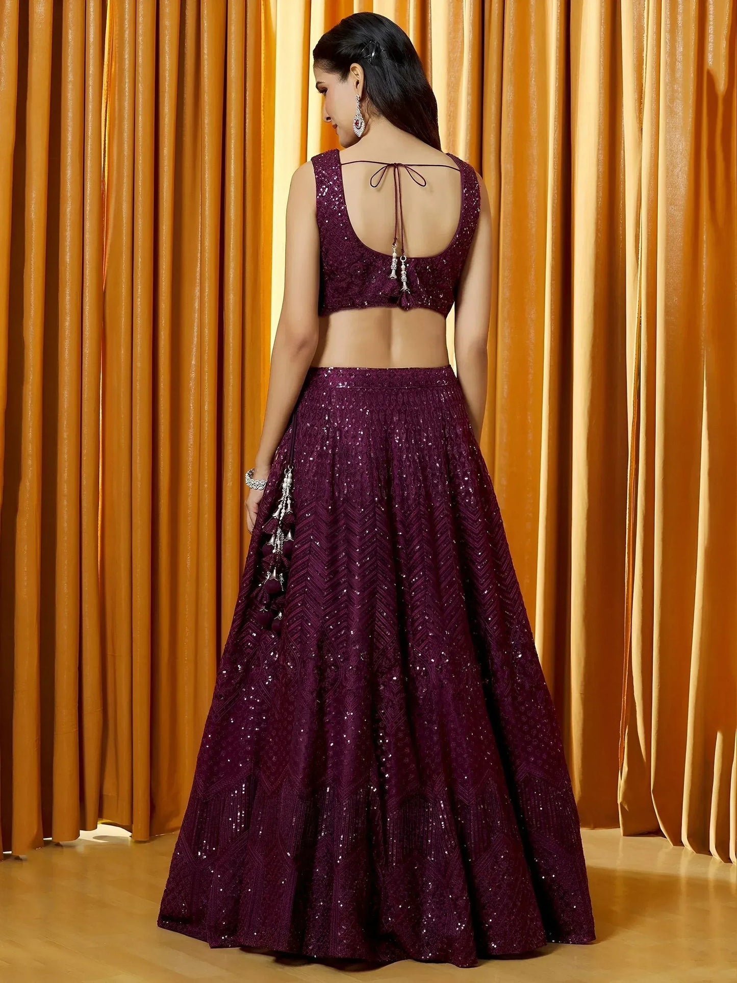Tulsi Art Marvelousâ Wine Thread Embroidered Net Reception Wear Lehenga Choli