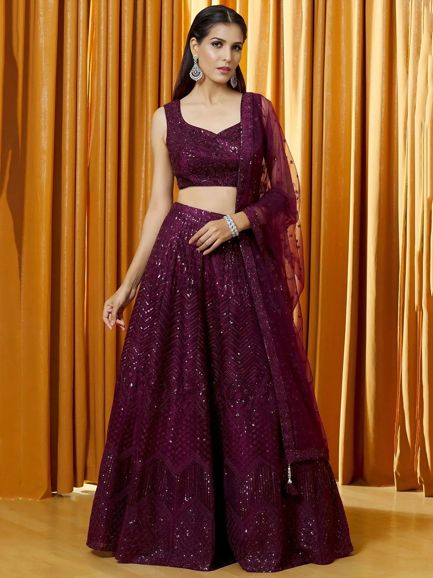 Tulsi Art Marvelousâ Wine Thread Embroidered Net Reception Wear Lehenga Choli