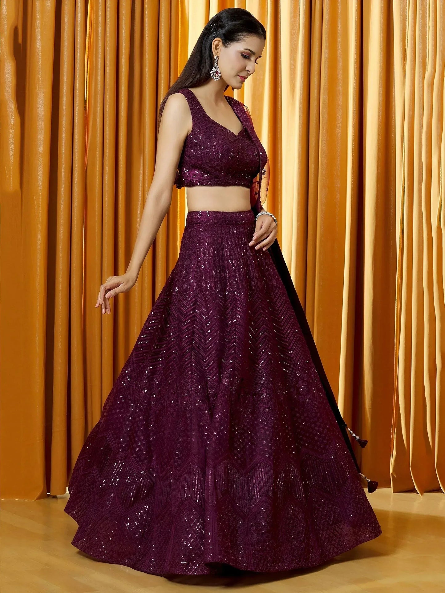 Tulsi Art Marvelousâ Wine Thread Embroidered Net Reception Wear Lehenga Choli