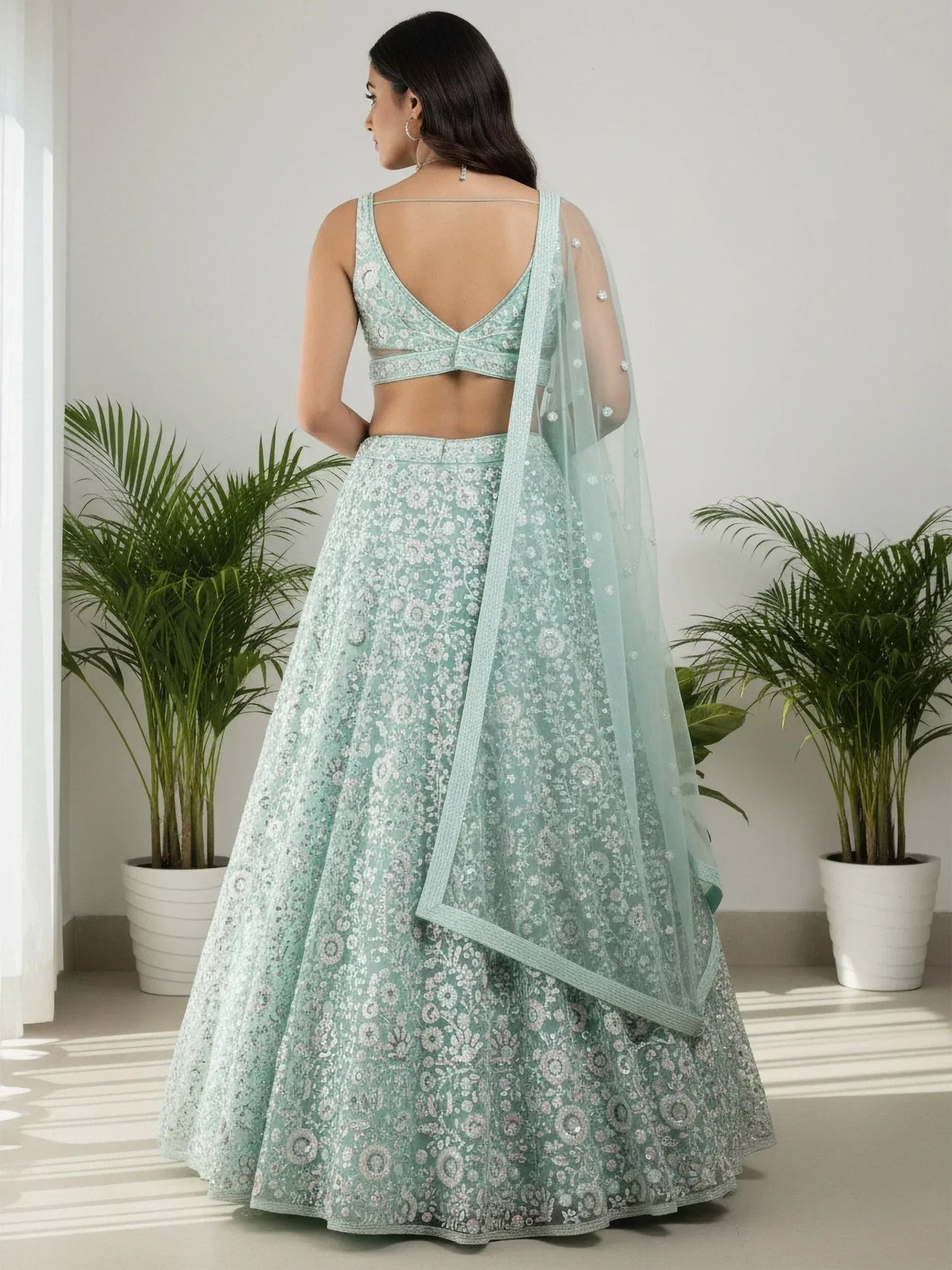 Tulsi Art Sparkling Green Sequins Embroidered Net Reception Wear Lehenga Choli
