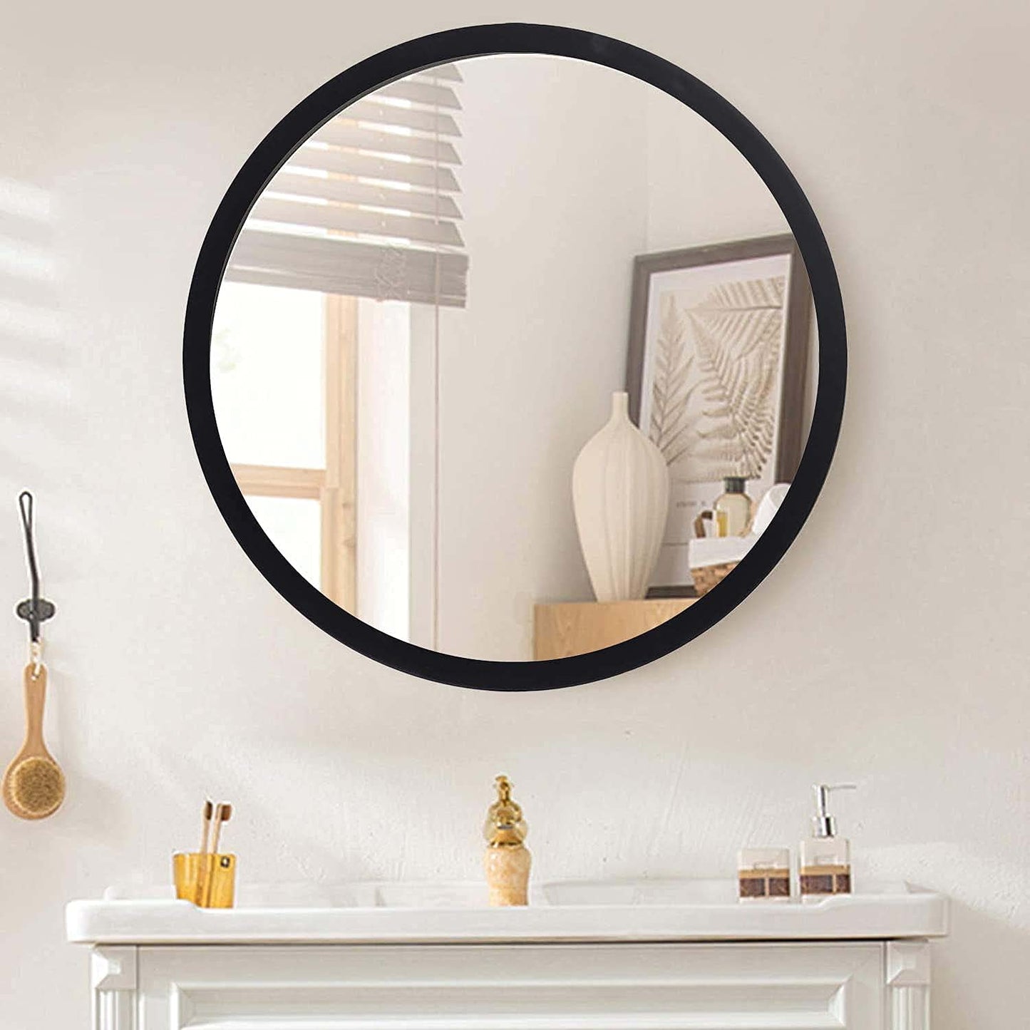 EFINITO round wall mirror with black frame in modern bathroom interior