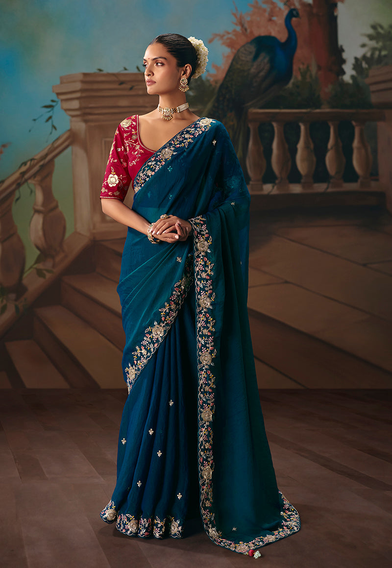 Monjolika Fashion Teal Blue Fancy Fabric Saree With Embroidered Work