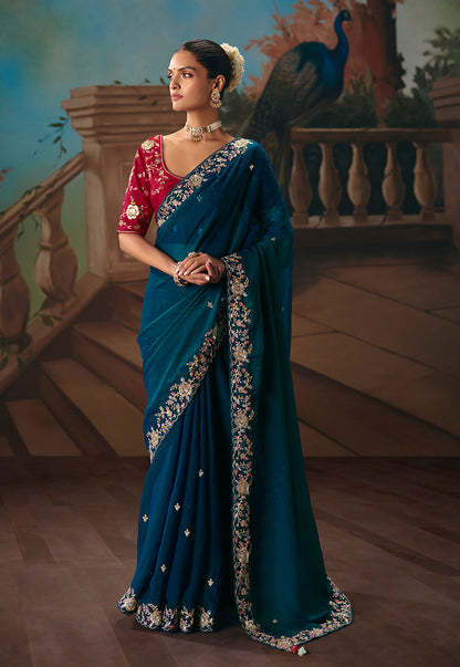 Monjolika Fashion Teal Blue Fancy Fabric Saree With Embroidered Work