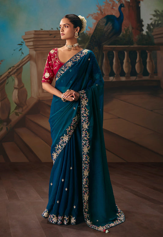 Monjolika Fashion Teal Blue Fancy Fabric Saree With Embroidered Work