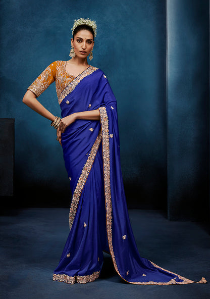 Monjolika Fashion Royal Blue Fancy Fabric Embroidered Saree With Stitched Blouse