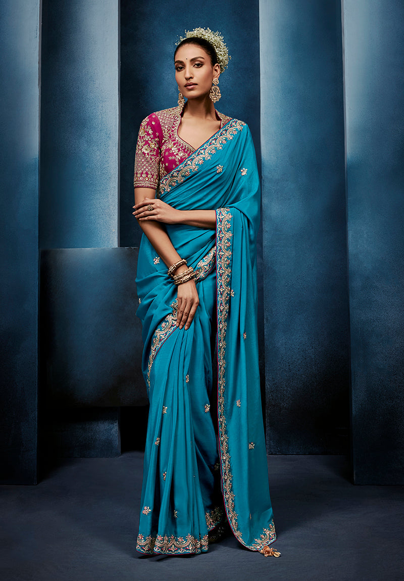 Monjolika Fashion Aqua Blue Fancy Fabric Embroidered Saree With Stitched Blouse