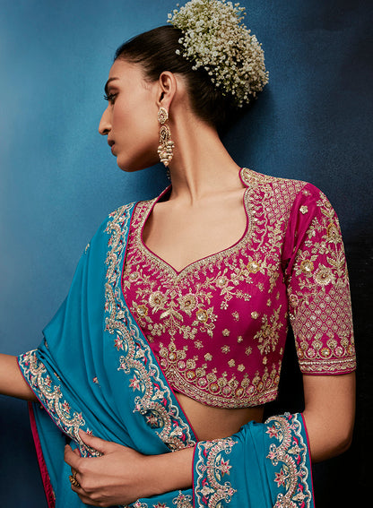 Monjolika Fashion Aqua Blue Fancy Fabric Embroidered Saree With Stitched Blouse